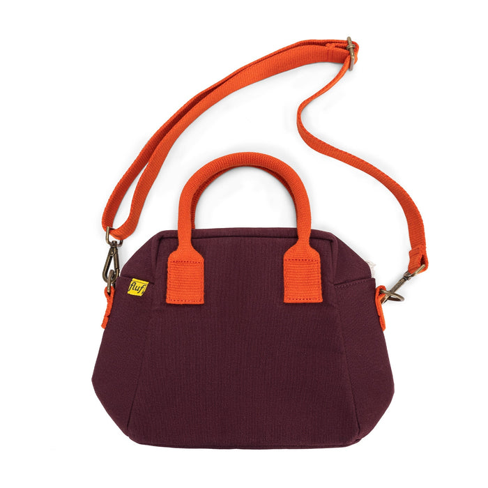 Lunch clutch bag in fig purple with orange handles and side zipper