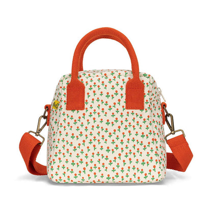 Lunch clutch bag in white with Tiny Roses pattern and orange top handles