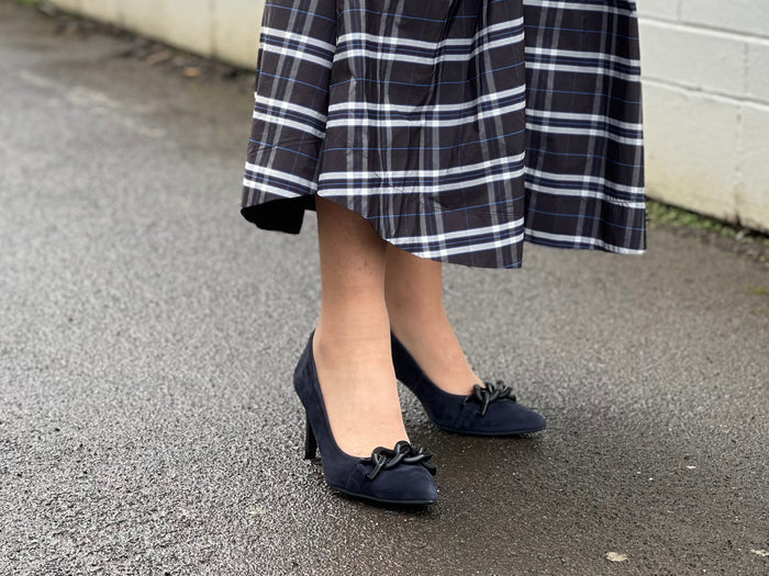 Comfortable, quality European women's stiletto sandal in suede leather. Quirky chain link detailing across the toe bar. Wedding or special occasion shoe in navy.