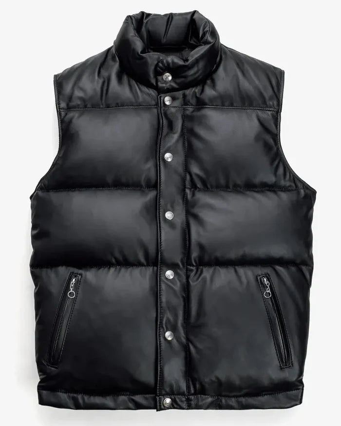 Front showcase of the Leveljacket Matte Black leather quilted puffer vest, detailing its wide horizontal thermal baffles, high insulated stand-up collar, front vertical zipper pockets, snap-button closure placket, and elasticated lower back hem.