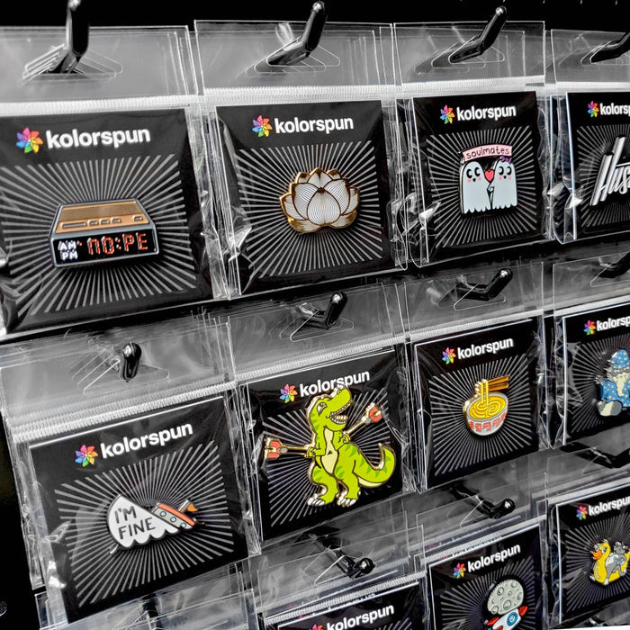 Kolorspun Pins mushroom-shaped magnetic golf ball marker on a golf tee, with a detailed mushroom design and magnetic attachment.