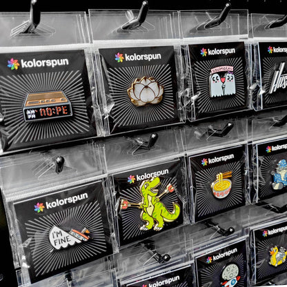 Kolorspun Pins mushroom-shaped magnetic golf ball marker on a golf tee, with a detailed mushroom design and magnetic attachment.
