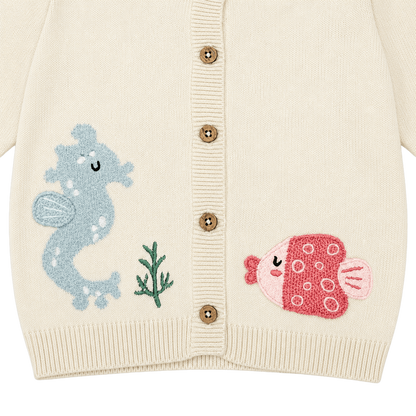 Close up of Ocean Friends Jacquard Knit Baby Cardigan Sweater made of organic cotton