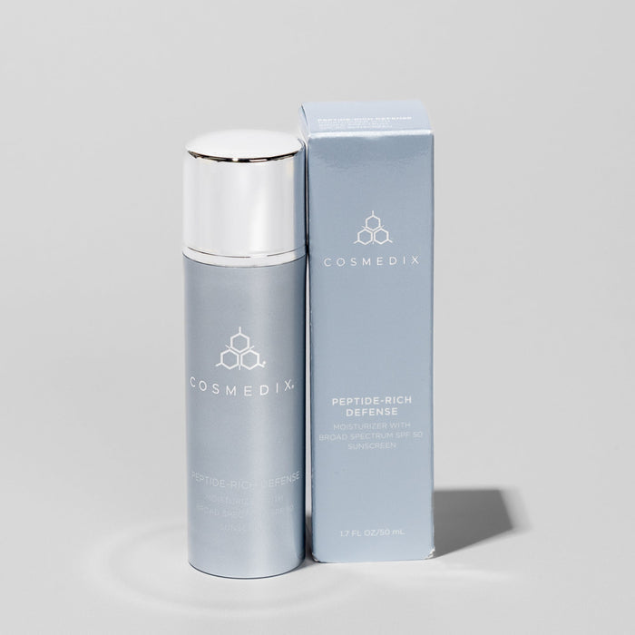 Peptide Rich Defense SPF 50 bottle and packaging against white backgound