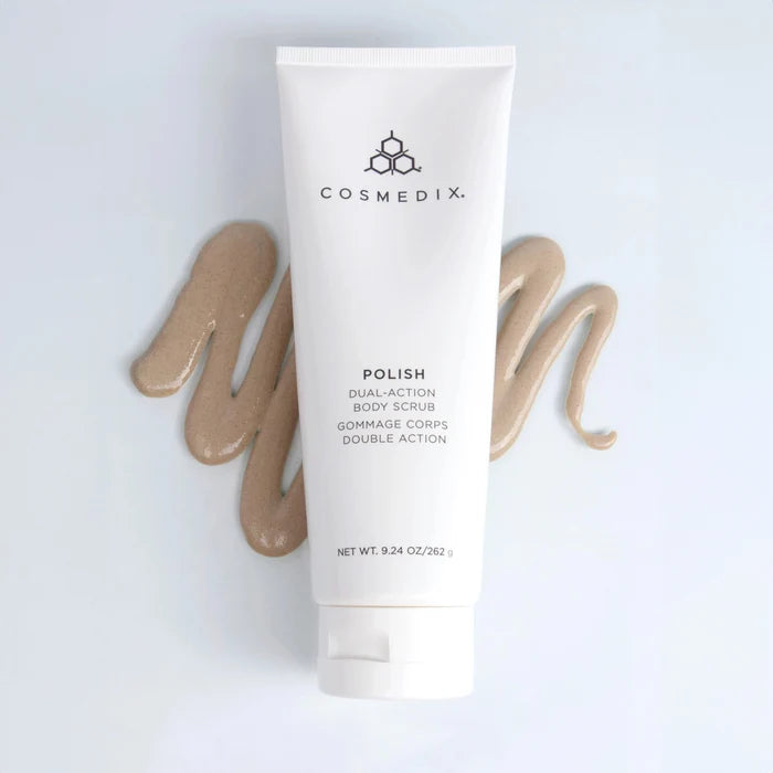 Polish Dual-Action Body Scrub tube with COSMEDIX logo and beige exfoliating swatches beside it