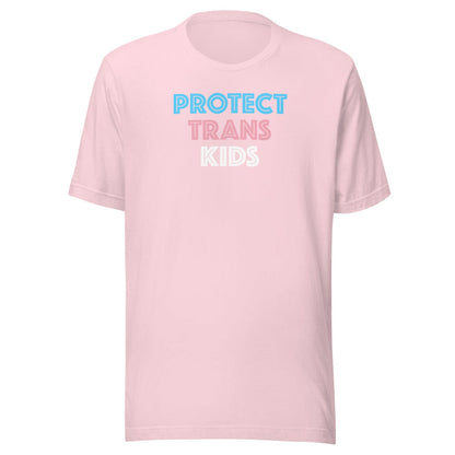 Protect Trans Kids unisex t-shirt in pink with bold blue, pink, and white graphic lettering on the front