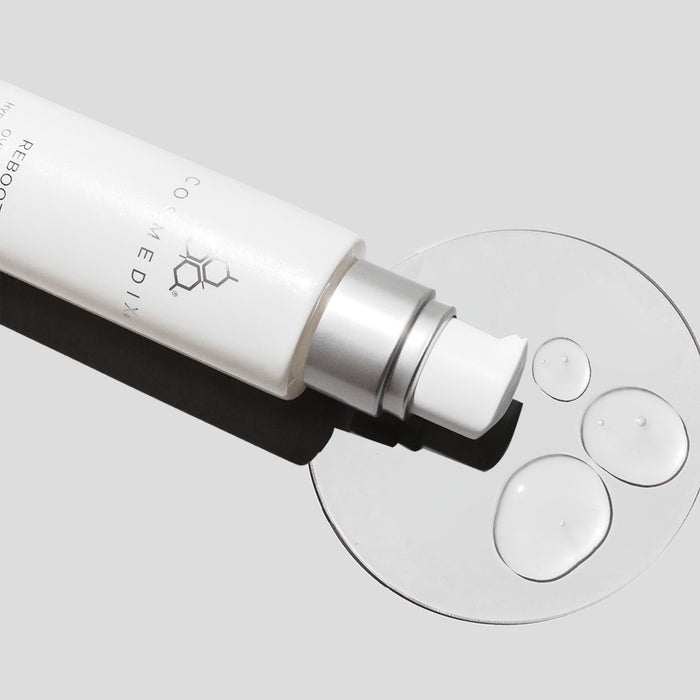 Close-up of Reboot Overnight Hydration Complex bottle with pump lying on its side