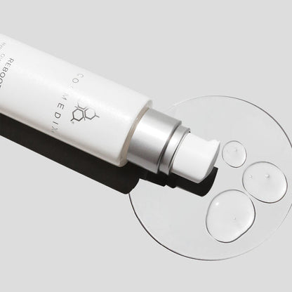Close-up of Reboot Overnight Hydration Complex bottle with pump lying on its side