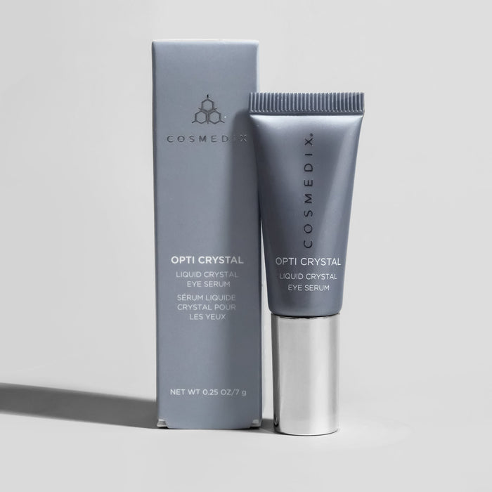 Close up of Opti Crystal eye serum with cleanser and hydrator packaging from the Rejuvenating Liquid Crystal Bundle