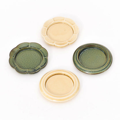 Ceramic incense tray set with round and flower shapes in green and yellow