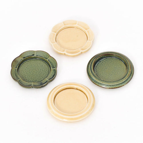 Ceramic incense tray set with round and flower shapes in green and yellow