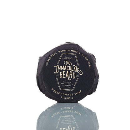 The Immaculate Beard shave soap puck with a smooth, round soap surface in a classic white color for a close, comfortable shave.