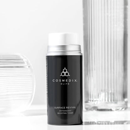 CosMedix Surface Revival Antioxidant Boosting Toner bottle with elite branding on dark label