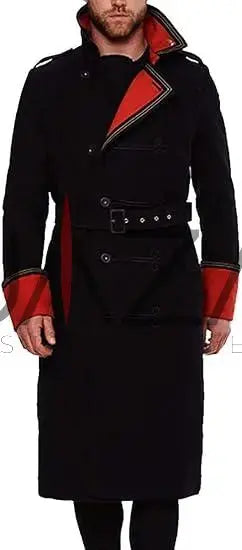 Black coat with red accents worn by a person on a white background